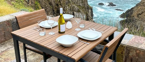 Yes, this REALLY is your own private outdoor dining area on the ocean!