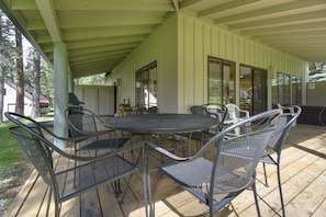 The wrap around deck with private hot tub