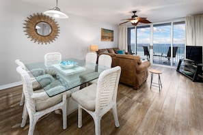 Dining area - Save on the vacay budget and dine-in. Dinner table for 6 and bar stools for extras