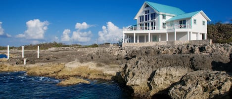 Perched on the shoreline with panoramic views of the Caribbean Sea.