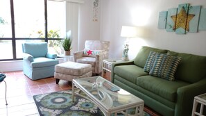 Comfortable seating area. Couch is a full size hide-a-bed.

