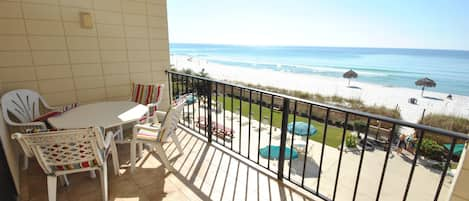 Balcony has seating for 4 at the table and overlooks the Gulf