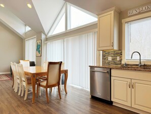Dining Area with seating for up to 10.  2nd leaf for the table in closet