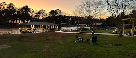 Large yard, fire pit, huge boathouse, and stunning sunsets