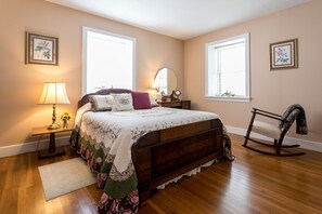 First bedroom featuring a wonderful queen bed