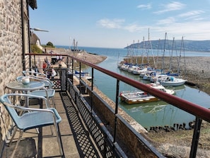 Drinks on your own private balcony overlooking Porlock Weir Harbour!