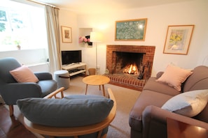 Ball Cottage sitting room with open fire