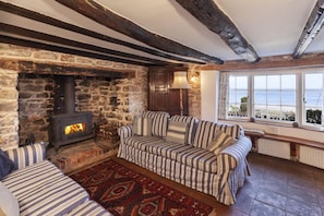 The Crows Nest sitting room with wood burner