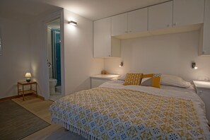 Bedroom 4 with double bed and 2 single beds and an ensuite shower room and WC