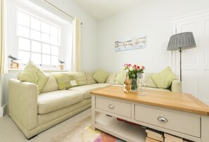 Ground floor: Sitting room with electric wood burner effect