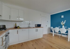 Bright spacious kitchen and dining area