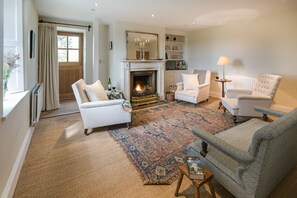 Overthwarts Farmhouse - drawing room with open fire