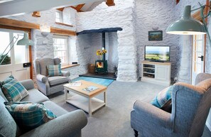 Ground floor: Sitting room with wood burning stove