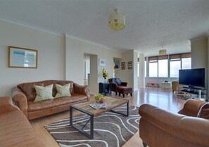 Comfortable leather sofas in the large sitting room