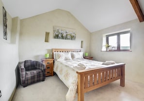 An attractive bedroom with Kingsize bed and shower room complete the internal accommodation