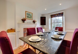 Lovely dining room with fireplace