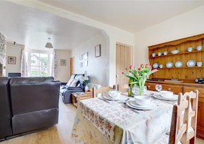 The spacious dining area and sitting room