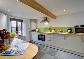 Modern spacious kitchen feels bright and welcoming