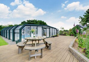 Enjoy a cool drink on the decking at the end of a busy day exploring North Devon