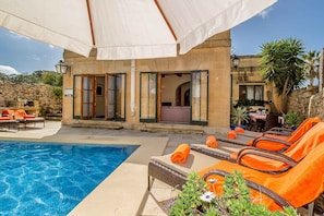 Pool and Deck area of Casetta Menzja holiday rental