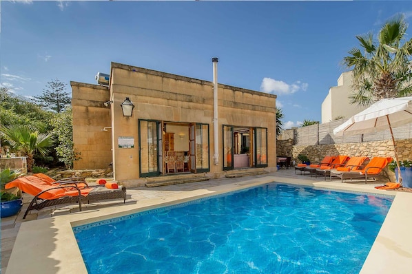 Pool area of Casetta Menzja holiday villa in Gozo