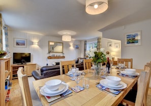The large dining table is perfect for family meals together