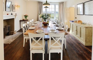 Ground floor:  Formal dining room with open log fire