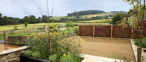 Damson Cottage with a private garden to the rear and its own patio