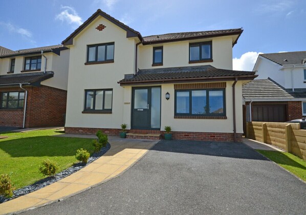 An external view of the property which benefits from private parking on the driveway