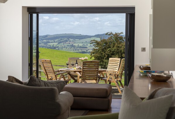 View onto the garden with gravel outdoor seating area