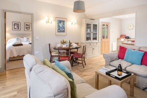 Barley Hill Cottage - open-plan living space and kitchen leading through to bedroom two