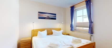 Schlafzimmer mit Doppelbett