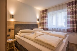 Schlafzimmer - Aparthotel AlpTirol