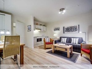 Ferienwohnung C1 Wohnzimmer / Essecke