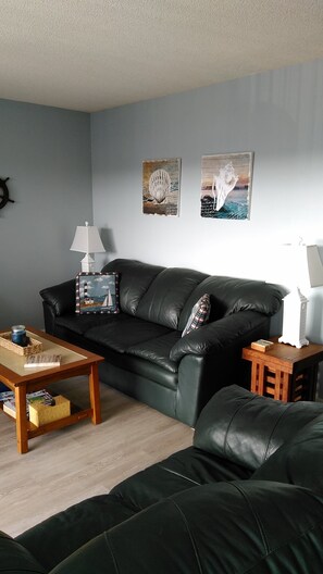 Living Room with sliding glass door to balcony