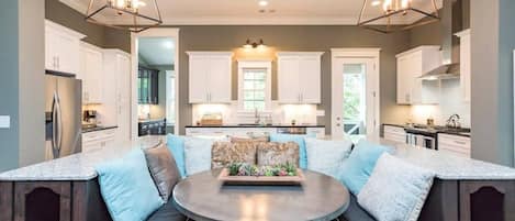 Built in dining area within the kitchen and living area. 