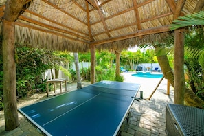 Ping Pong. Tiki Hut. Seating. Ring Game. Located off Pool