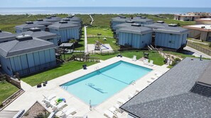 Cool off in Elegance at Our Serene Community Pool