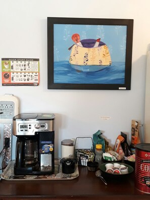 A coffee nook provides a place to make a variety of coffee's and teas.  