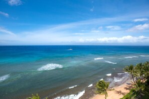 Let the island stretch before you like a dream?layered in blue, kissed by waves, and framed by dancing palms MAH-1211