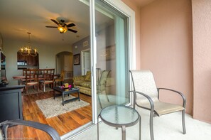 The sliding doors beckon, leading you to to the  terrace—a tranquil retreat where the outside world fades away, and moments of peace and serenity await.