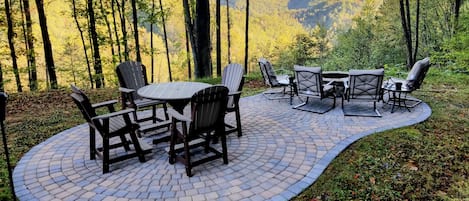 Outdoor dining and relaxing with long range views and firepit!