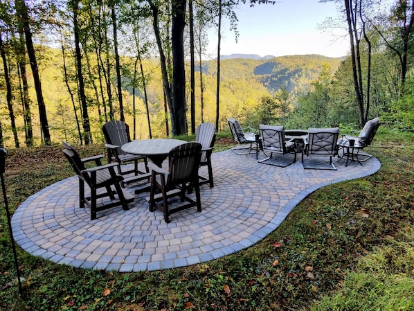 Outdoor dining and relaxing with long range views and firepit!