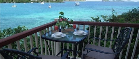 Waterfront dining on the private terrace.