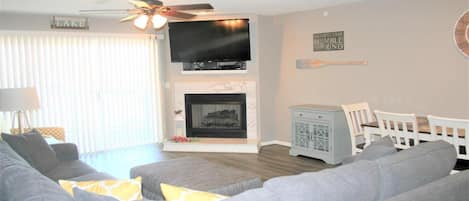 Spacious family room with extra large smart TV 
