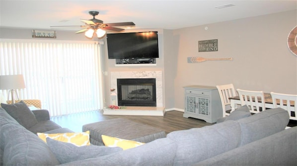 Spacious family room with extra large smart TV 