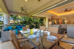 Seamless indoor/outdoor access to the lanai and living room. .