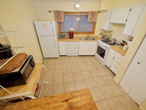 Fully Equipped Kitchen - The fully equipped kitchen is sizable and has all the amenities needed for a great stay.