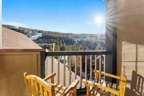Private balcony with outdoor seating.