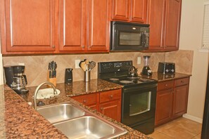 Kitchen with granite countertops
